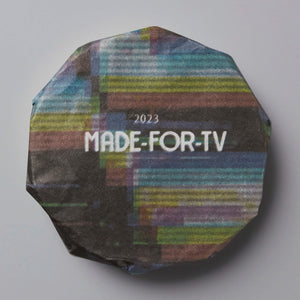 2023 MADE-FOR-TV sheng puer tea cake with colorful retro TV static design on wrapper