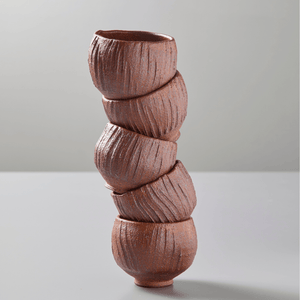 five red ceramic tea cups