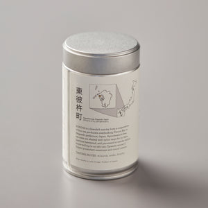 Matcha Sonogi ceremonial grade tea in white cylindrical tin with Japanese text and map design on minimalist label